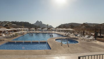 2 outdoor pools, open 7:00 AM to 9:00 PM, pool umbrellas