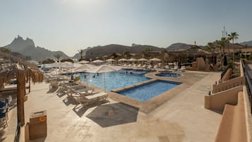 2 outdoor pools, open 7:00 AM to 9:00 PM, pool umbrellas