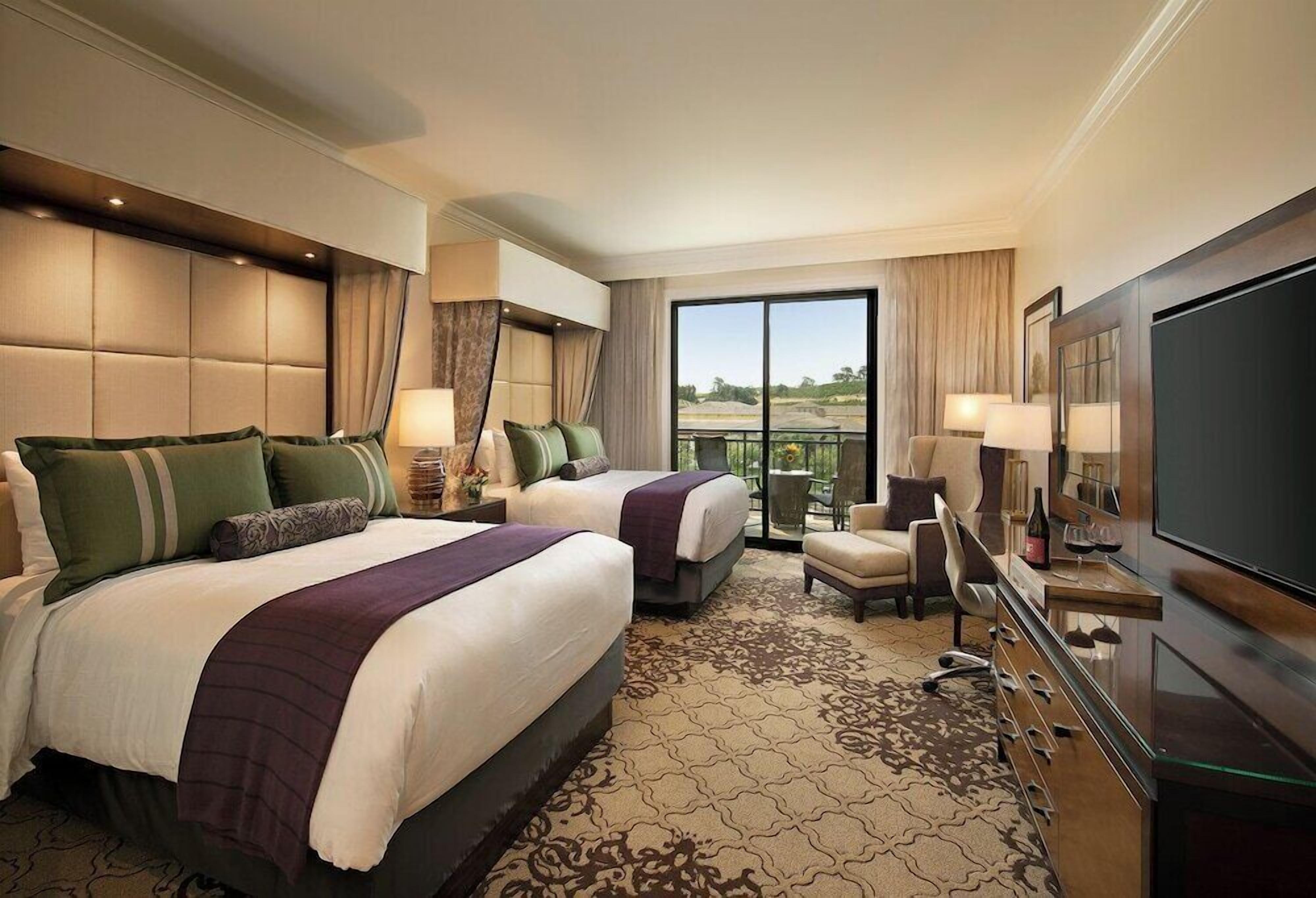Premium bedding, down comforters, pillowtop beds, in-room safe