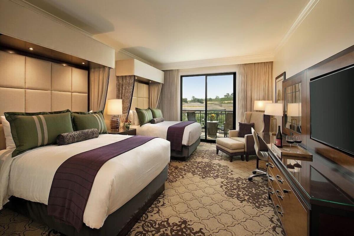 Premium bedding, down comforters, pillowtop beds, in-room safe