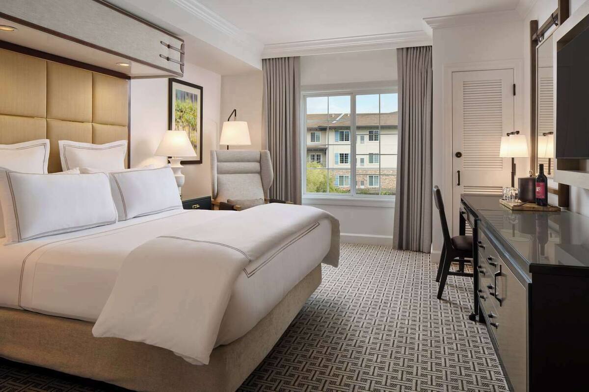 Premium bedding, down comforters, pillowtop beds, in-room safe