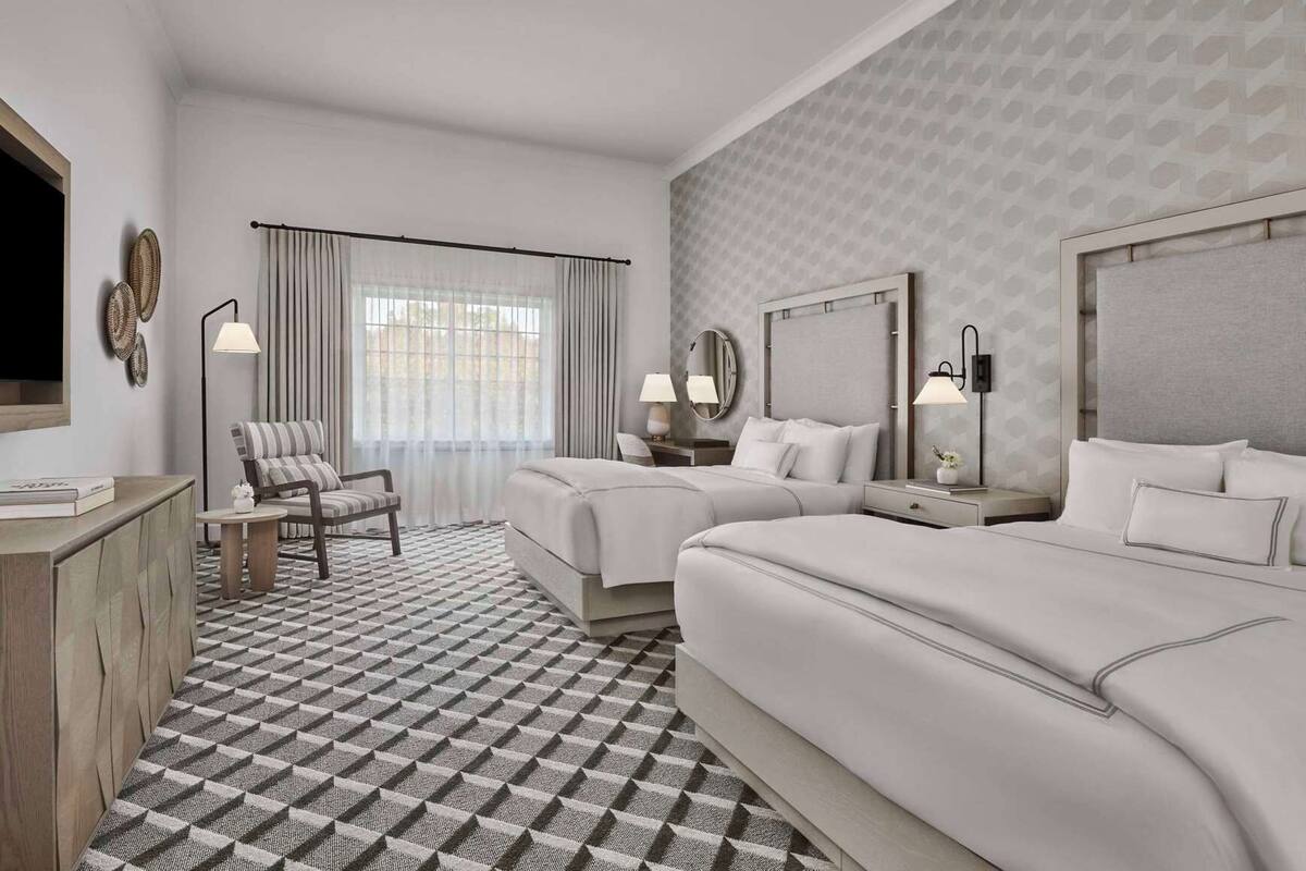 Premium bedding, down comforters, pillowtop beds, in-room safe