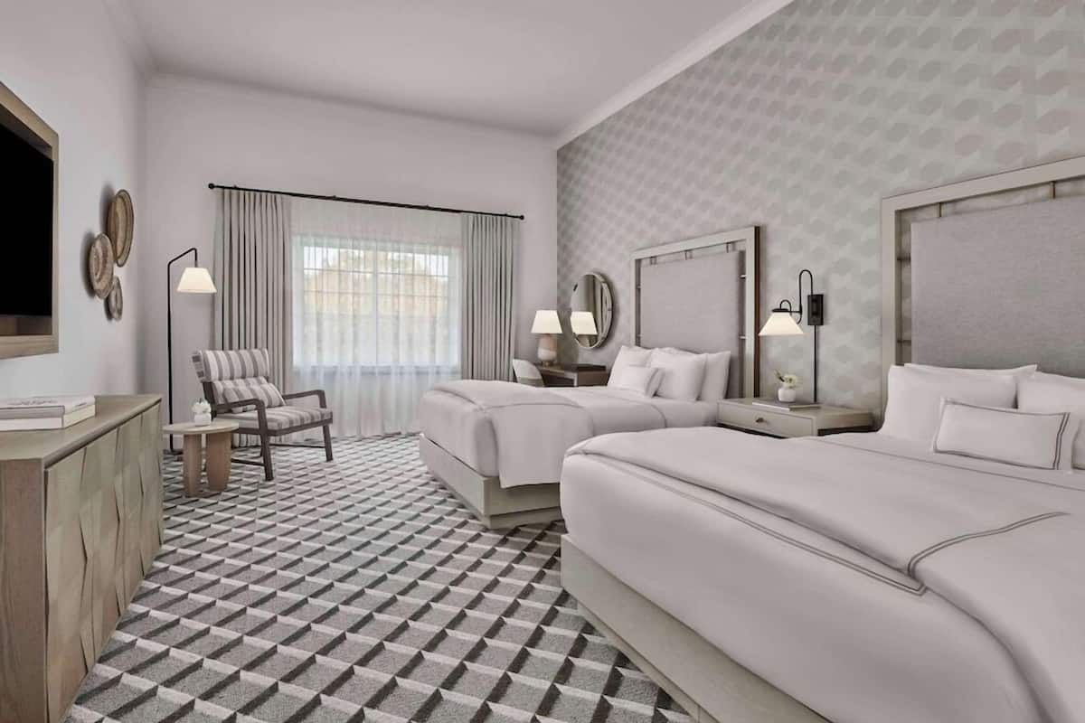 Premium bedding, down comforters, pillowtop beds, in-room safe