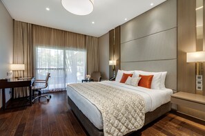 Deluxe Pool View King | Living area | 42-inch LED TV with cable channels