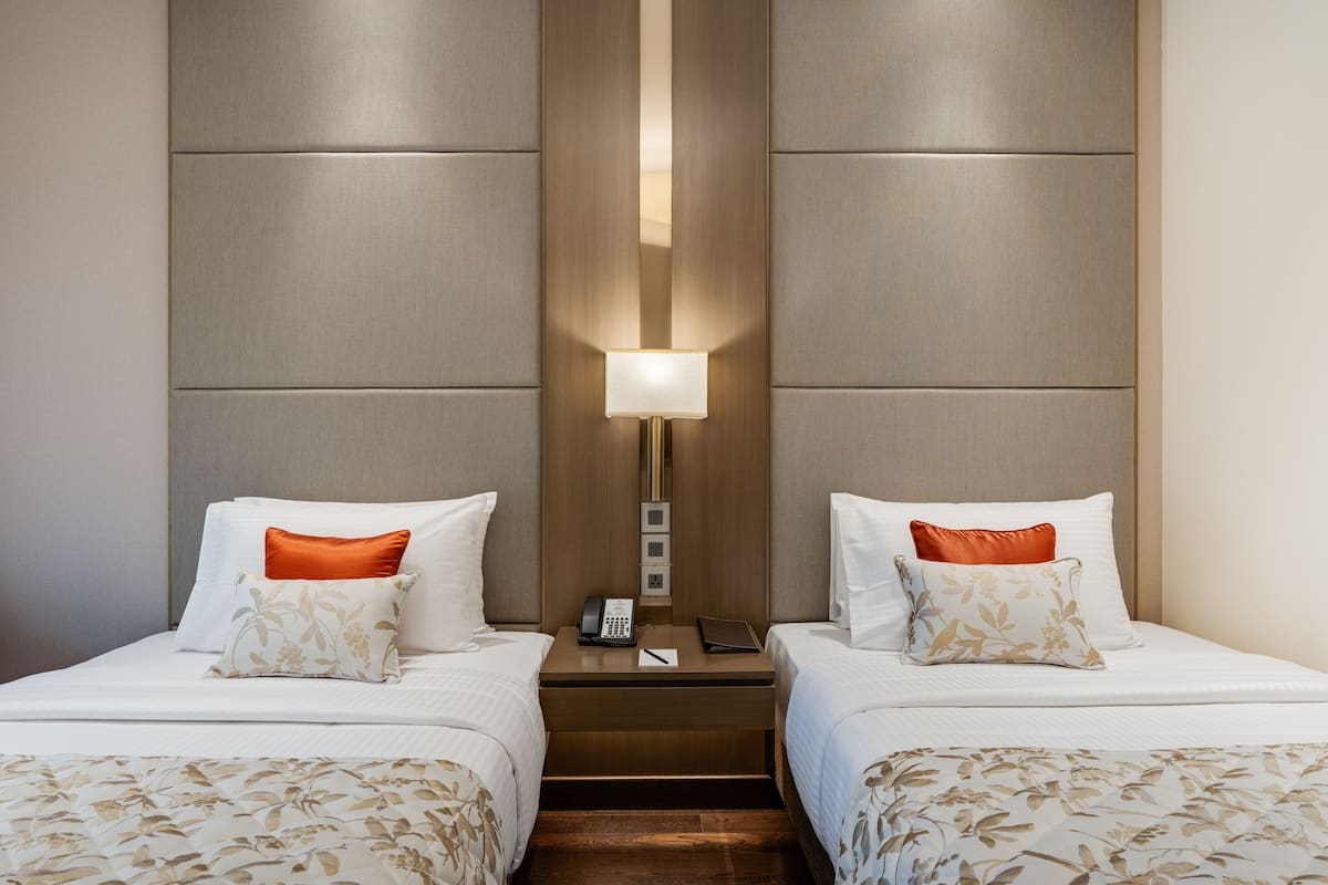 deluxe pool view twin | living area | 42-inch led tv with cable channels