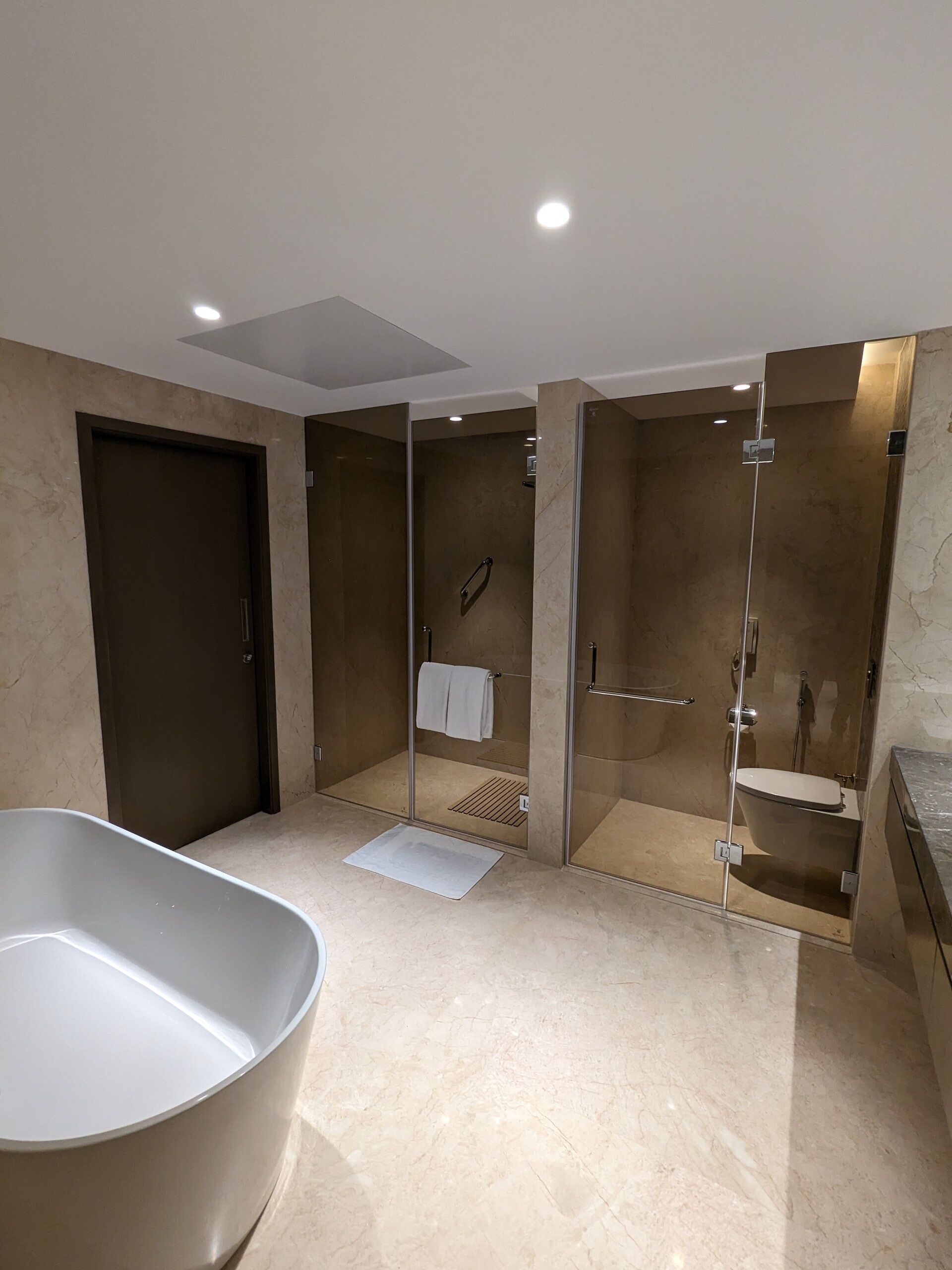 suite | bathroom | rainfall showerhead, free toiletries, hair dryer, bathrobes