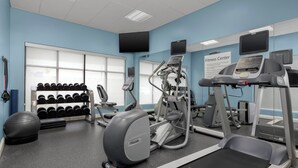 A fitness center with treadmills, elliptical machines, and a rack of dumbbells. - Holiday Inn Express Knoxville-Strawberry Plains by IHG (Knoxville)