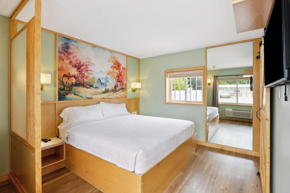 Chambre Deluxe, 1 trĂšs grand lit
