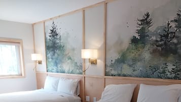 Habitación doble Deluxe | Escritorio, espacio para trabajar con laptop y cortinas blackout
