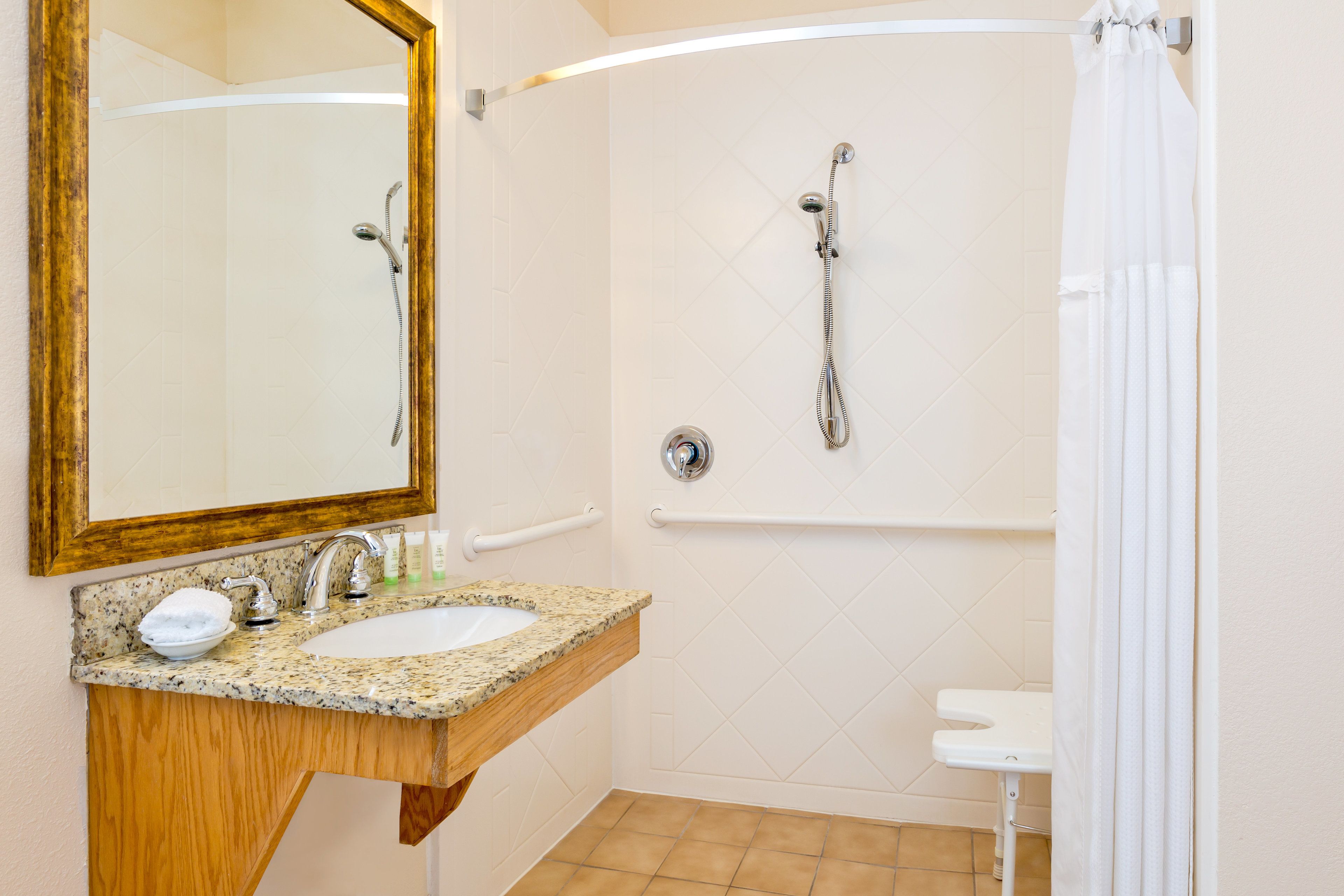 suite, 2 bedrooms, accessible, kitchen (comm, roll shwr) | bathroom | combined shower/bathtub, hair dryer, towels