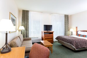 Suite estudio, 1 cama de matrimonio, cocina | Caja fuerte, escritorio, espacio para trabajar con un portátil