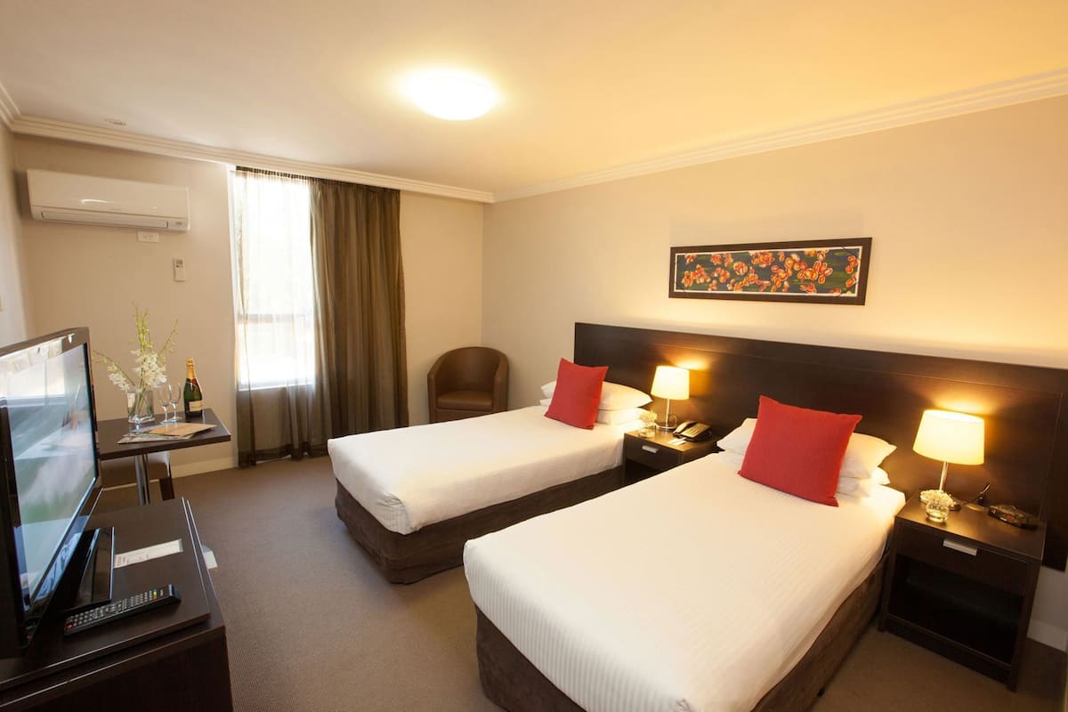 Blackout drapes, iron/ironing board, free WiFi, bed sheets
