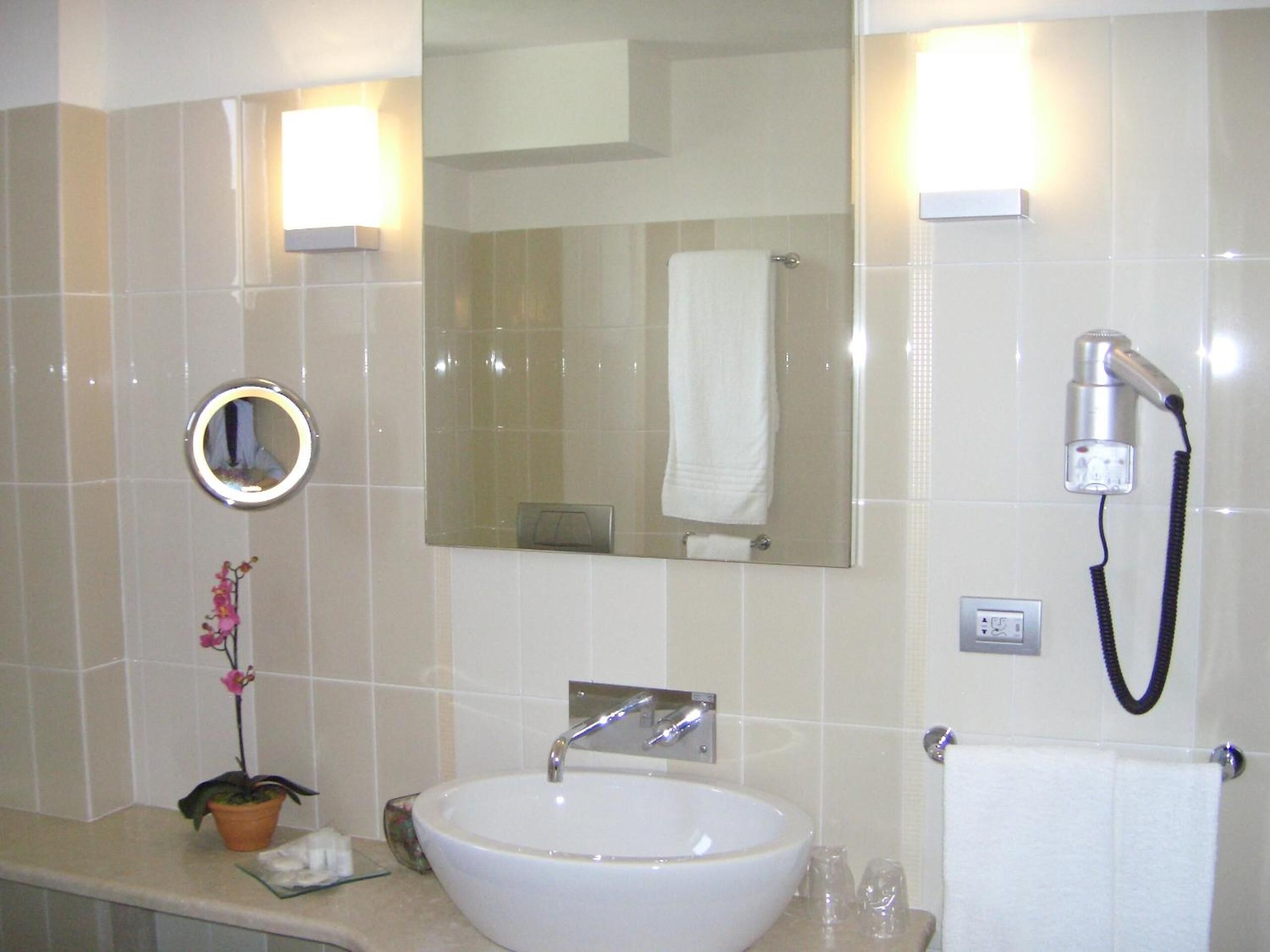 free toiletries, hair dryer, slippers, bidet