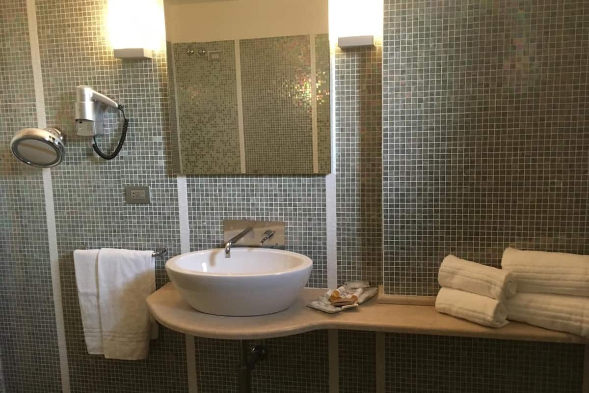 free toiletries, hair dryer, slippers, bidet