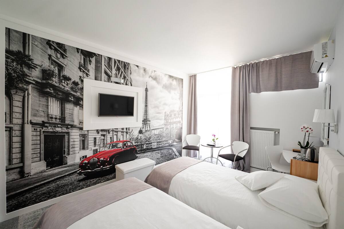 superior twin room | 1 bedroom, in-room safe, desk, iron/ironing board