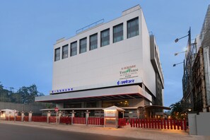 A modern hotel building with a prominent sign for "The Fern E-Square Hotel Pune". - E-Square The Fern Pune, Series by Marriott (Pune)