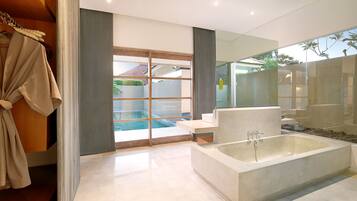 Combined shower/bathtub, free toiletries, hair dryer, bathrobes