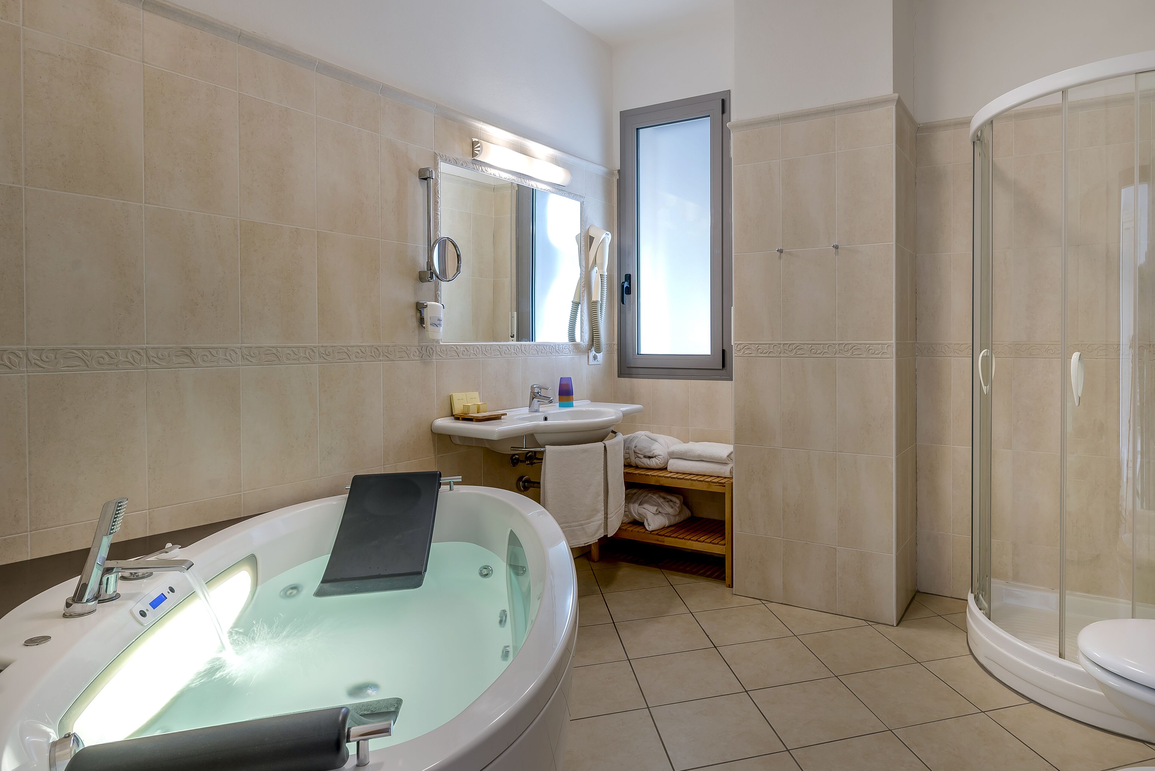 eco-friendly toiletries, hair dryer, bathrobes, slippers