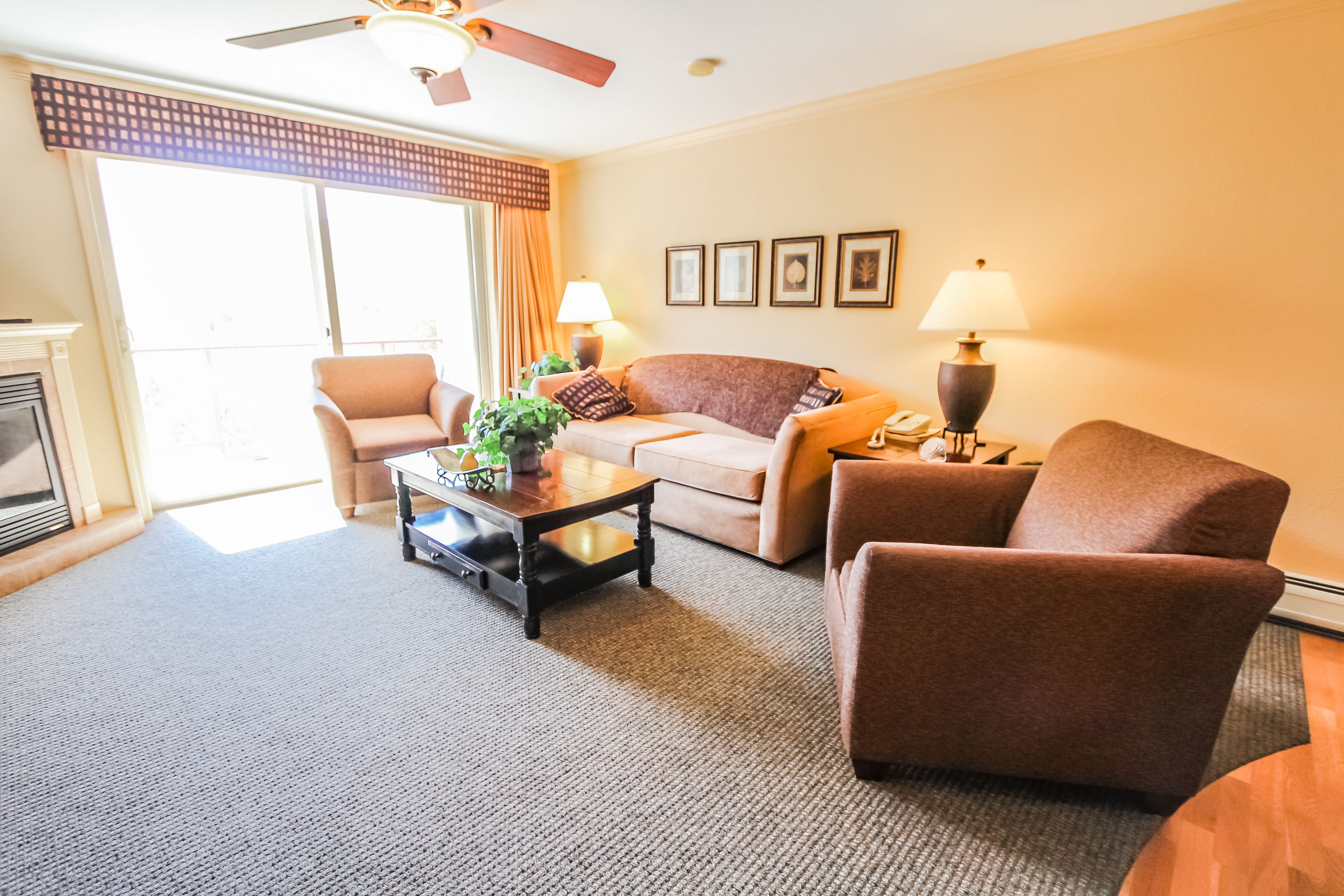 Deluxe Room, 2 Bedrooms | Living room | Flat-screen TV, fireplace, DVD player