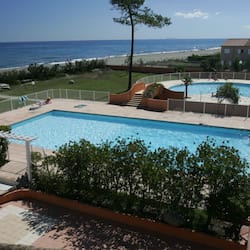 2 outdoor pools, open 10:00 AM to 8:00 PM, pool loungers