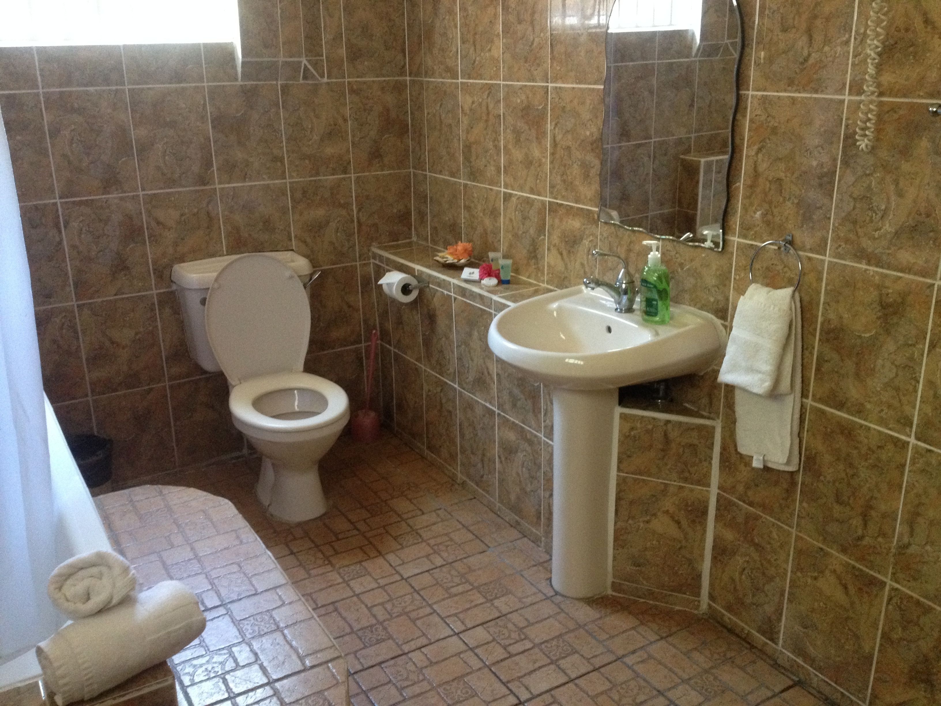 grand villa, 2 bedrooms, beach view | bathroom | free toiletries, hair dryer, towels