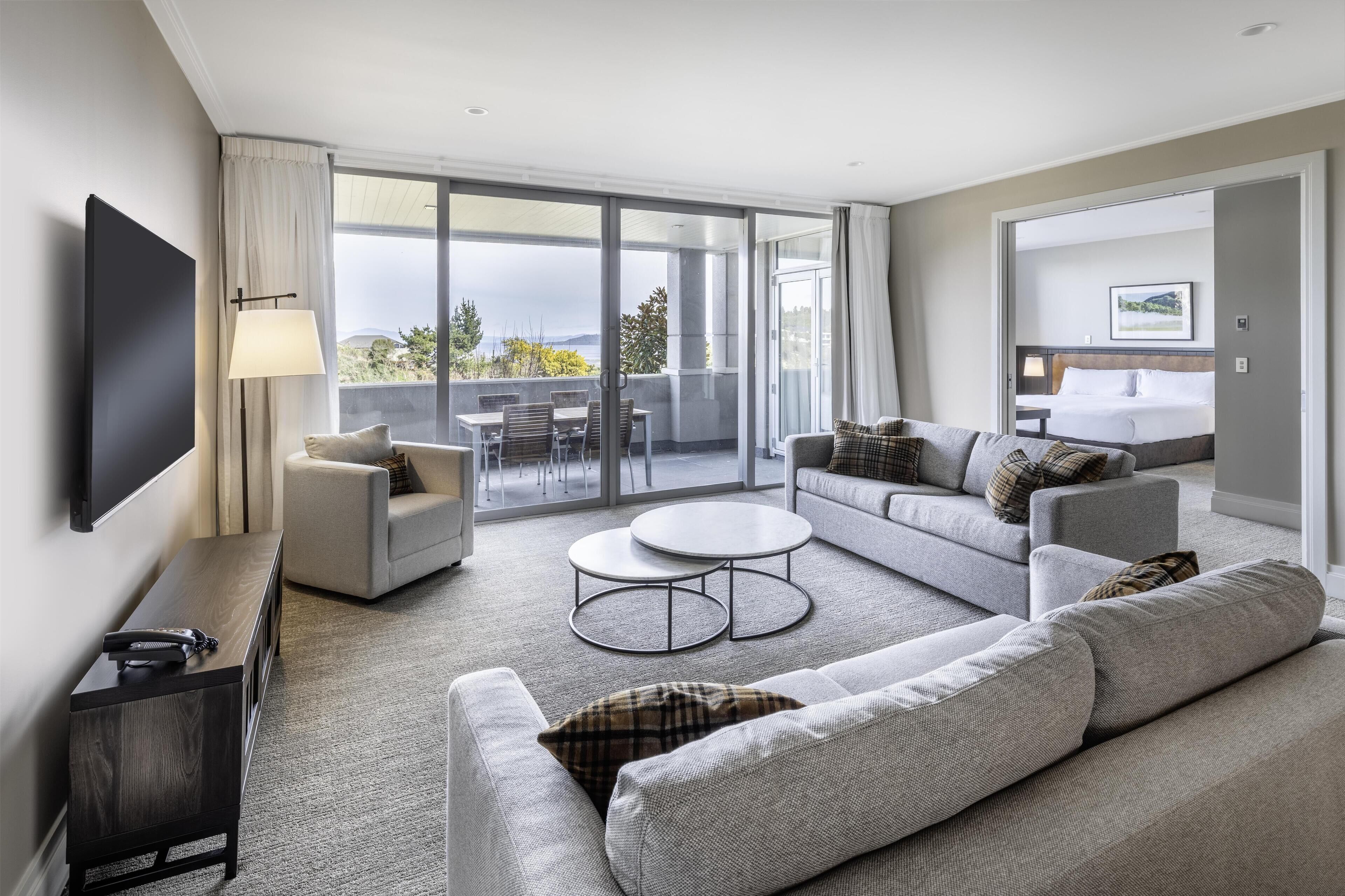 Apartment, 1 King Bed (Plus) | Living area | 32-inch LCD TV with cable channels, TV