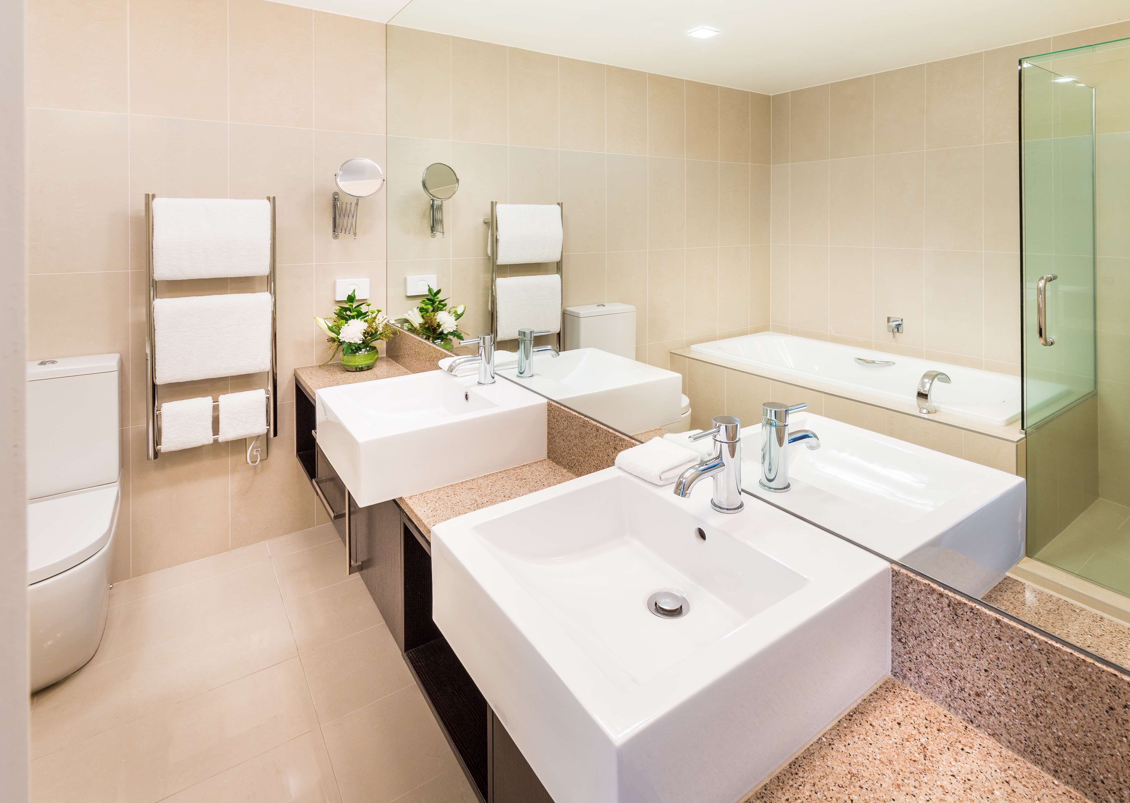 designer toiletries, hair dryer, bathrobes, towels