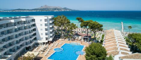 Indoor pool, outdoor pool, pool umbrellas, pool loungers