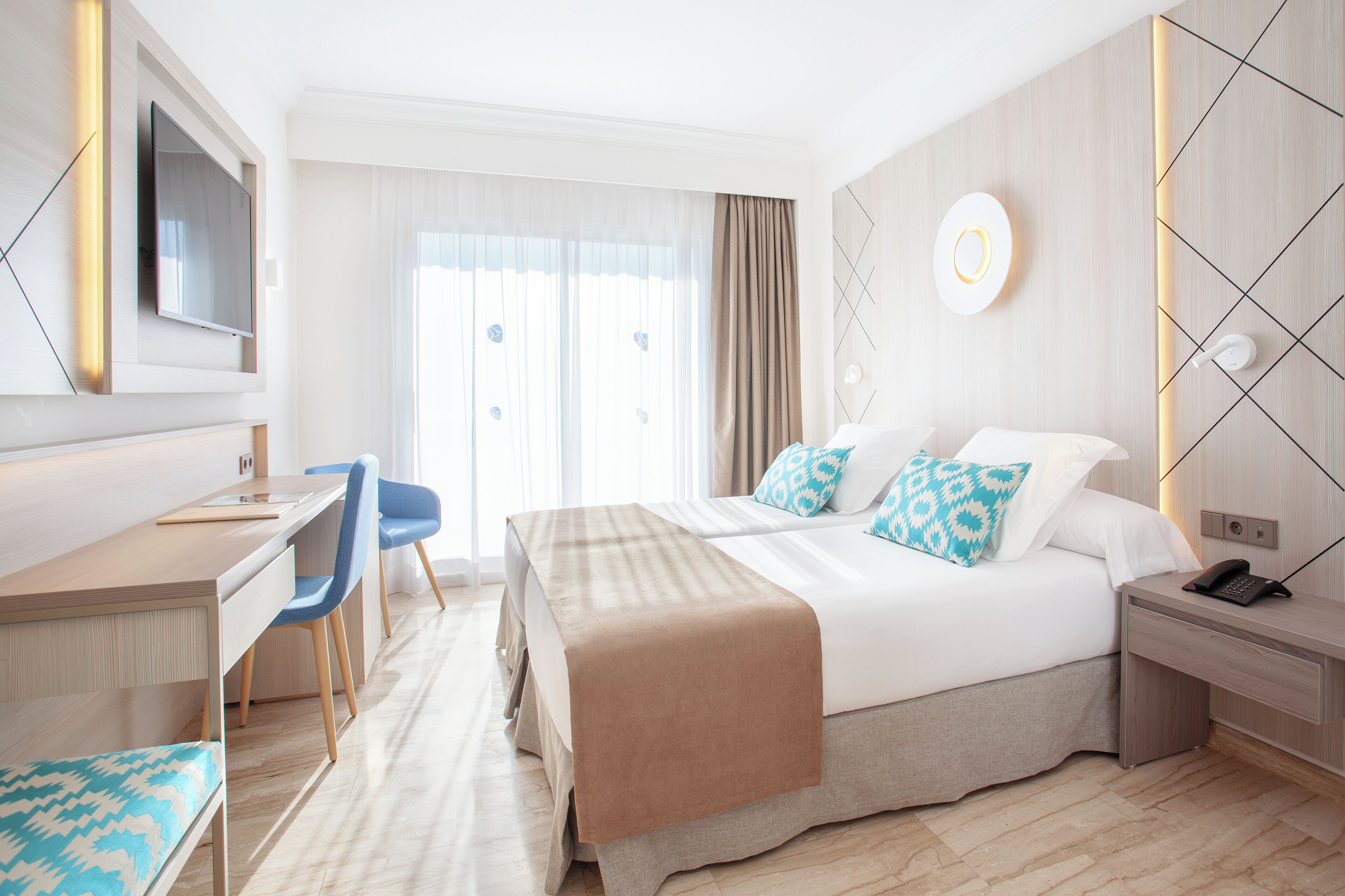 Double Room, Balcony, Partial Sea View | Minibar, desk, free cots/infant beds, free WiFi