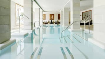 Indoor pool, outdoor pool, pool umbrellas, pool loungers