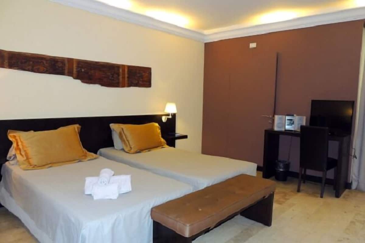 Premium bedding, down duvets, pillow-top beds, minibar