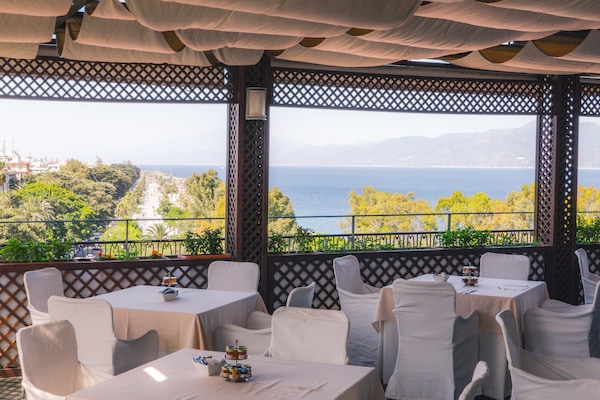 Breakfast, lunch, dinner served; Mediterranean cuisine, ocean views