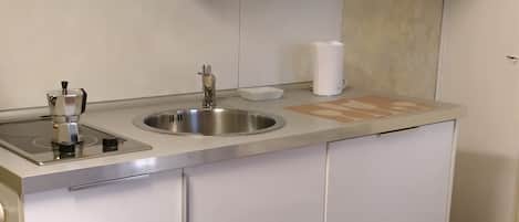 Apartamento standard, 1 cama Queen, vista para a cidade, em edifício anexo | Cozinha privada