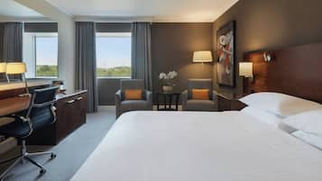 Premium bedding, down duvets, pillow-top beds, in-room safe