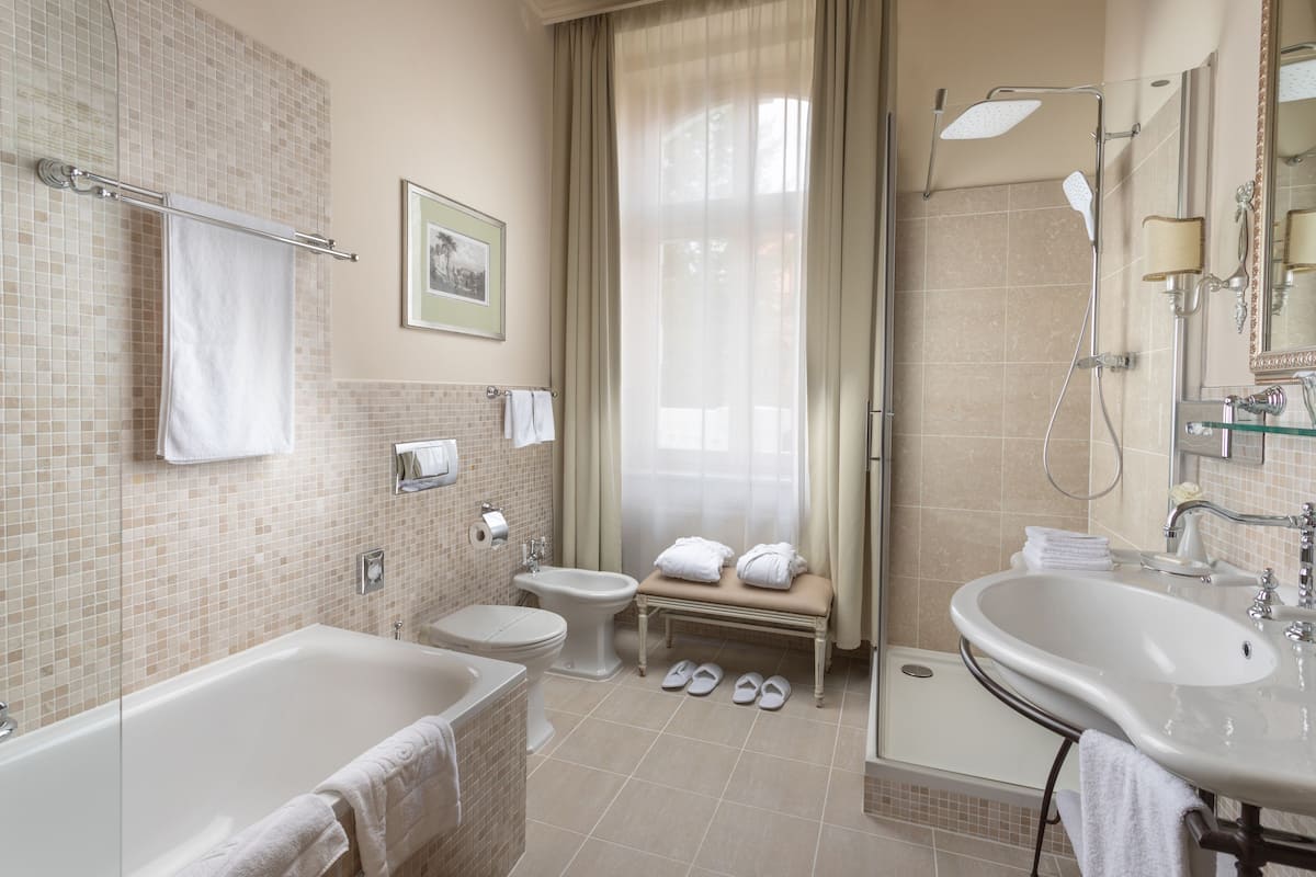 deep-soaking bathtub, free toiletries, hair dryer, bathrobes