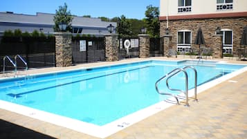 Seasonal outdoor pool, open 8:00 AM to 7:30 PM, pool umbrellas