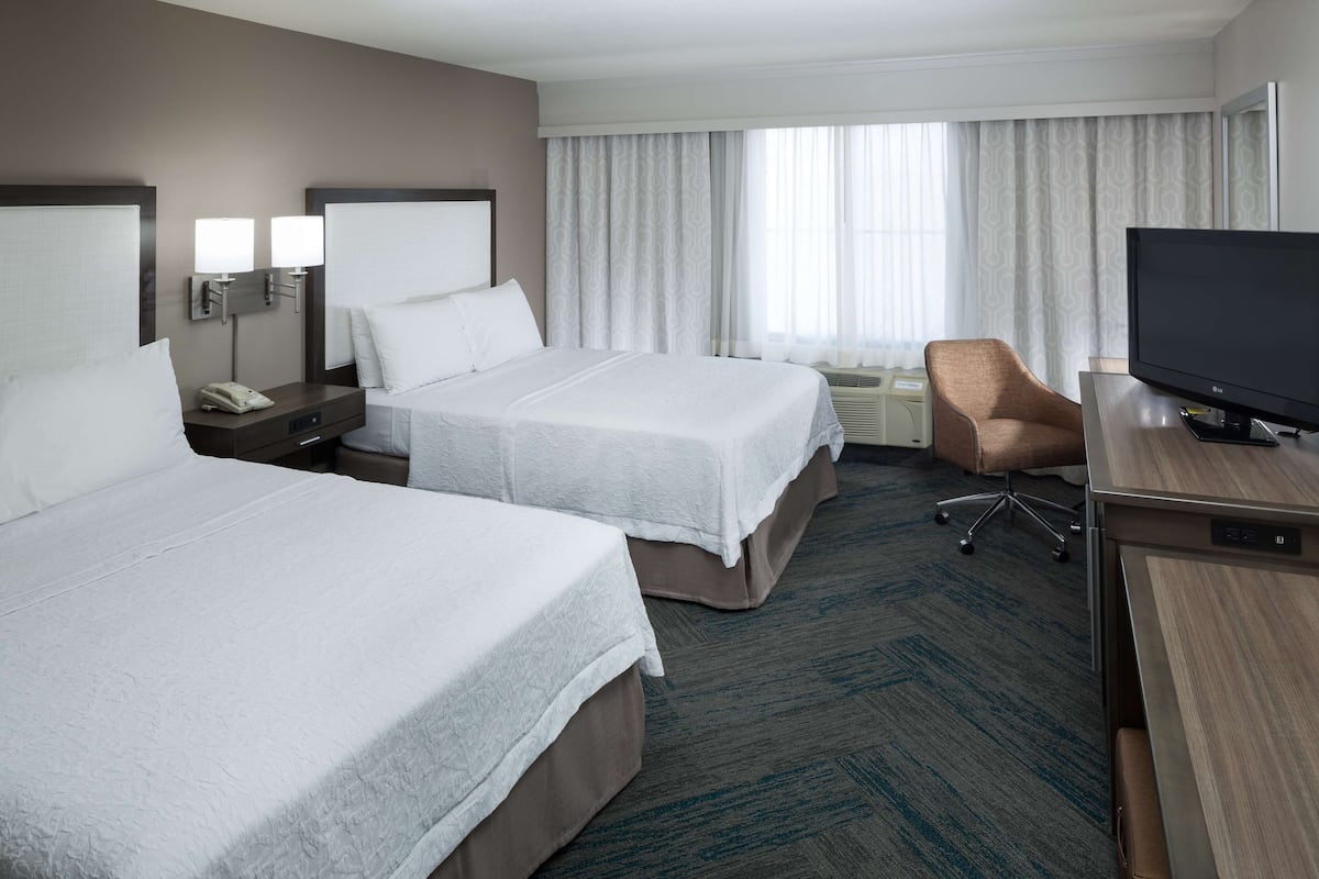 Premium bedding, desk, blackout drapes, iron/ironing board