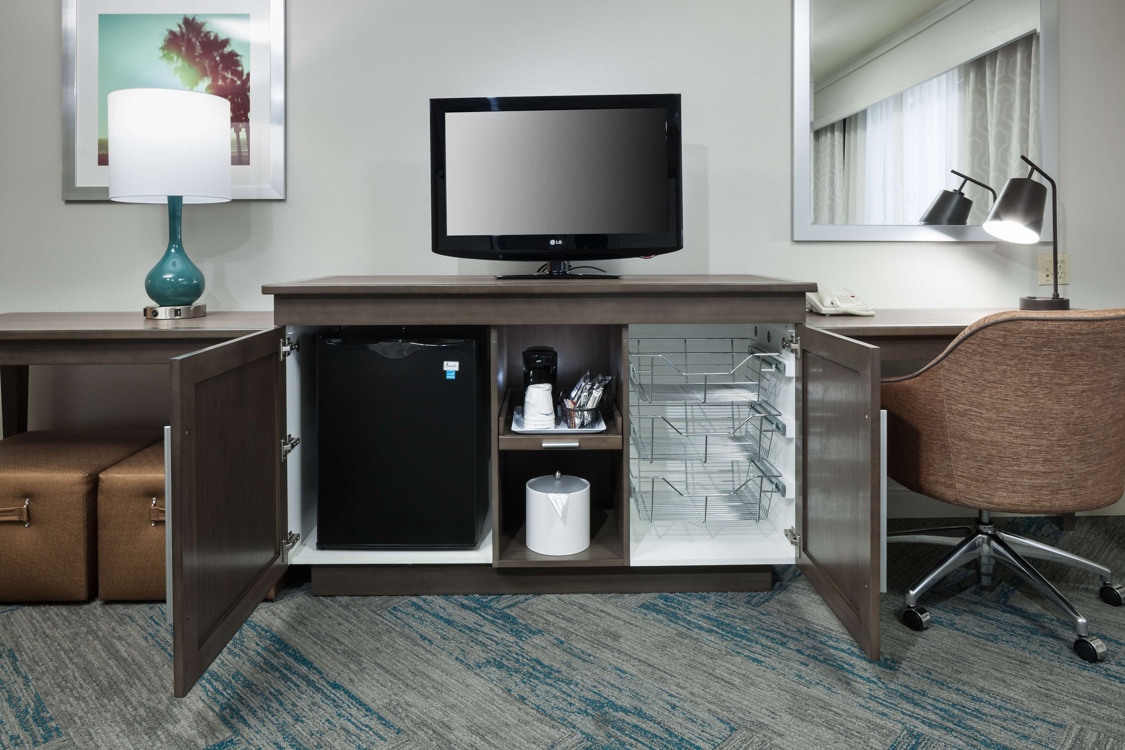 premium bedding, desk, blackout curtains, iron/ironing board