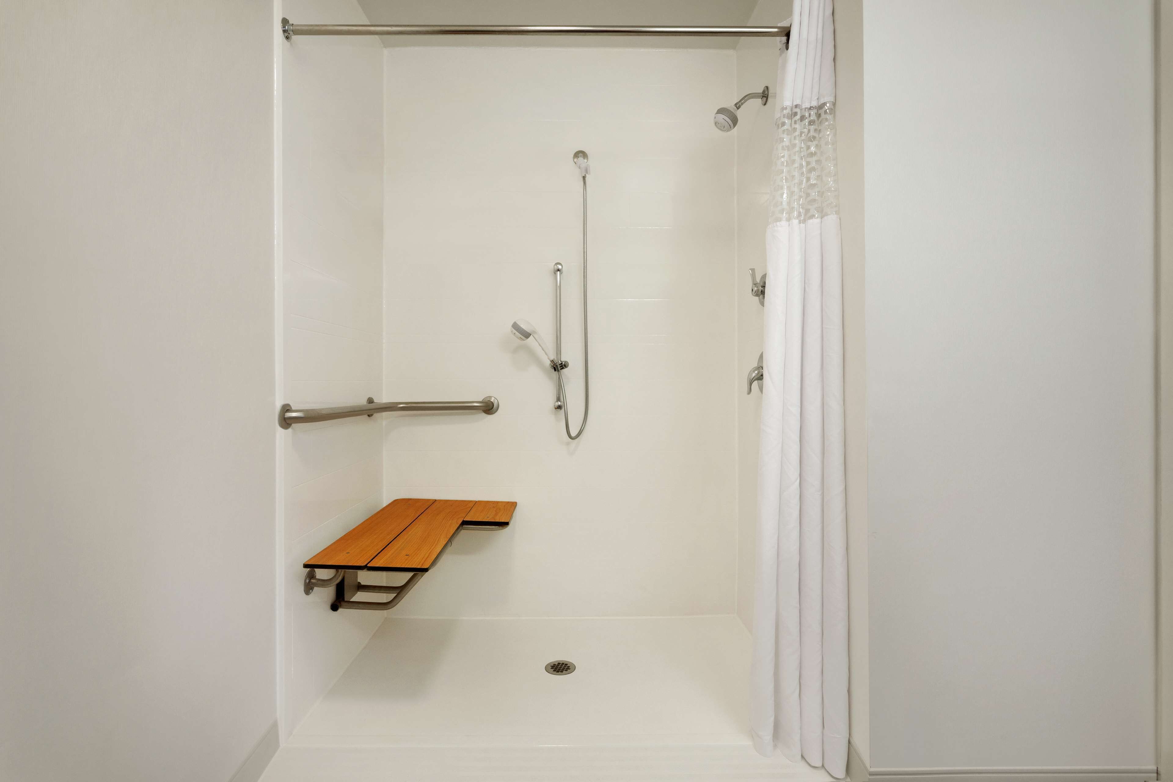 studio, 1 king bed, accessible, non smoking | bathroom | combined shower/bathtub, hydromassage showerhead, free toiletries