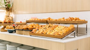 A buffet with various pastries and desserts. - Barcelo Valencia Hotel (Valencia)