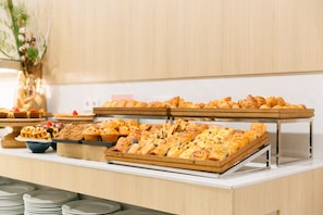 A buffet with various pastries and desserts. - Barcelo Valencia Hotel (Valencia)