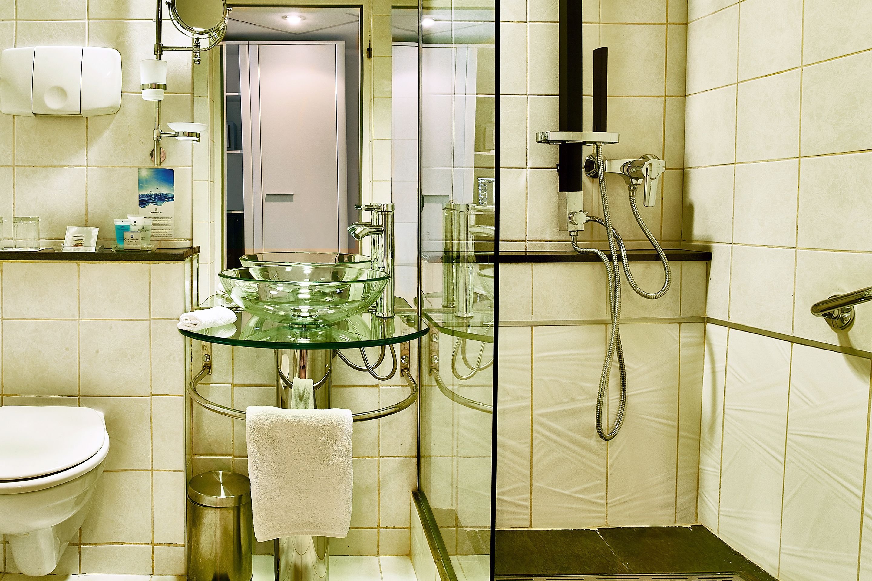 combined shower/bathtub, free toiletries, hair dryer, bathrobes