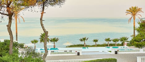 Beach umbrellas, beach towels, waterskiing, windsurfing