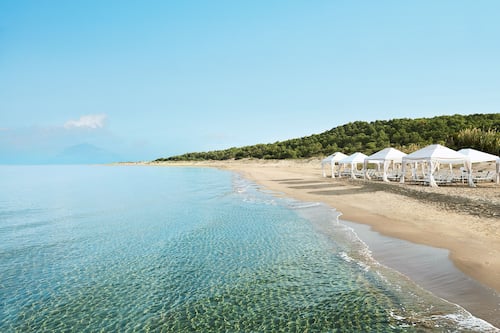Beach umbrellas, beach towels, water skiing, windsurfing