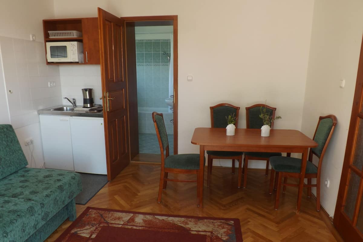 Comfort Apartment, 1 Bedroom, Garden Area | Select Comfort beds, in-room safe, individually decorated
