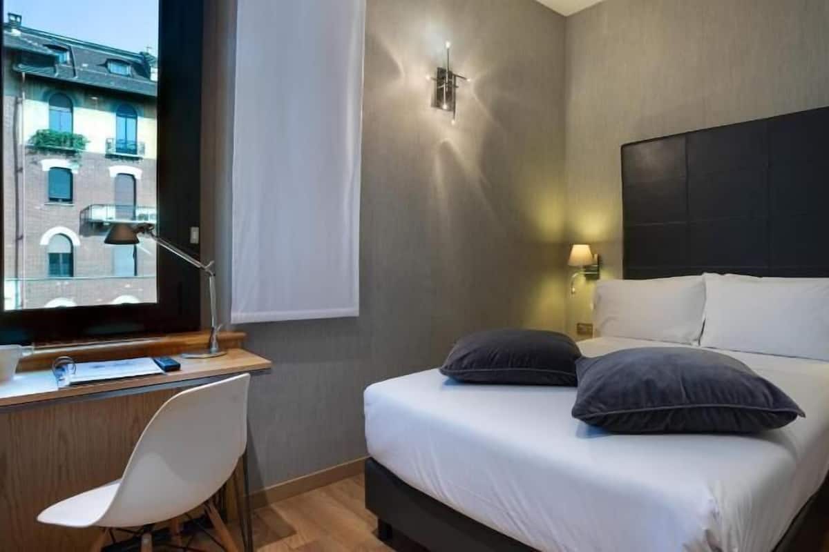 Premium bedding, down duvets, Select Comfort beds, minibar