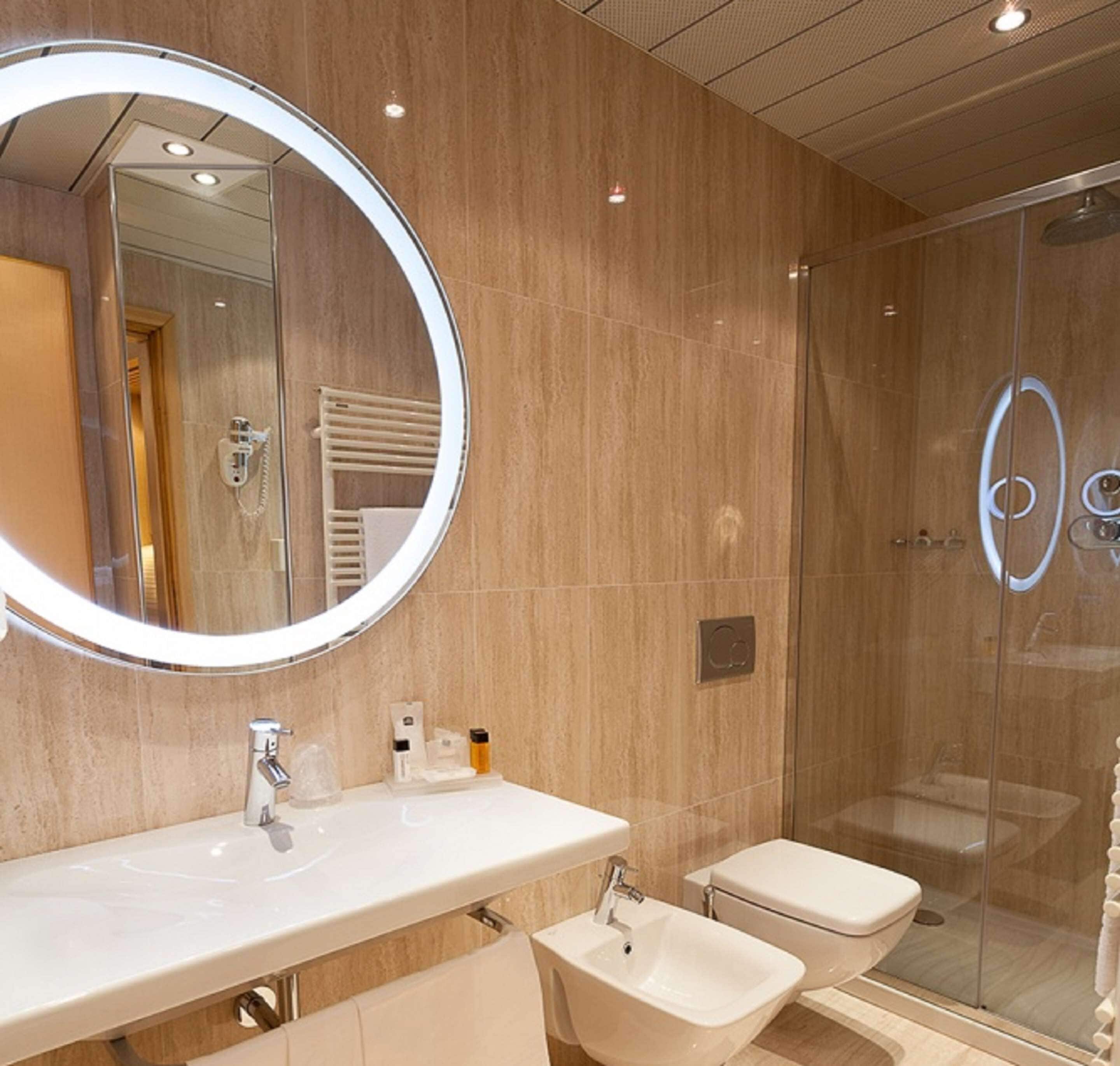 shower, rainfall showerhead, hair dryer, slippers