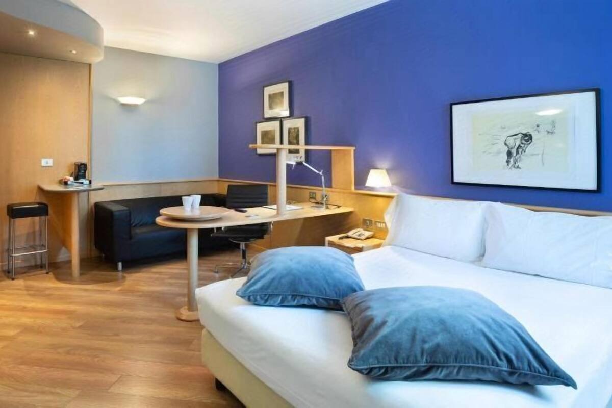Premium bedding, down comforters, Select Comfort beds, minibar