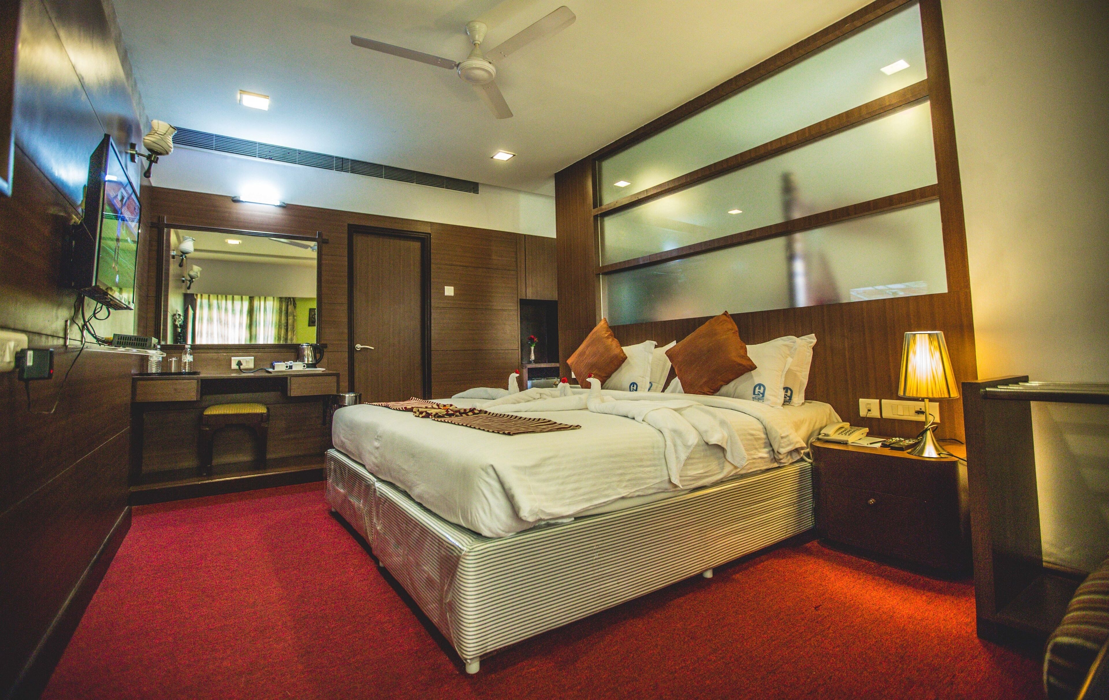 이그제큐티브 스위트 | 이집트산 면 시트, 고급 침구, 오리/거위털 이불, 셀렉트 컴포트 침대