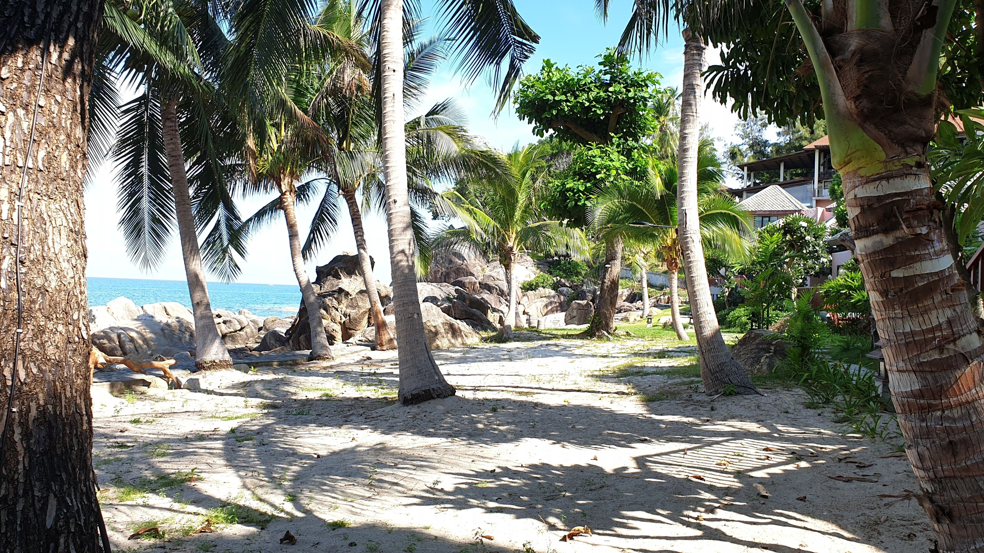 Private beach nearby, black sand